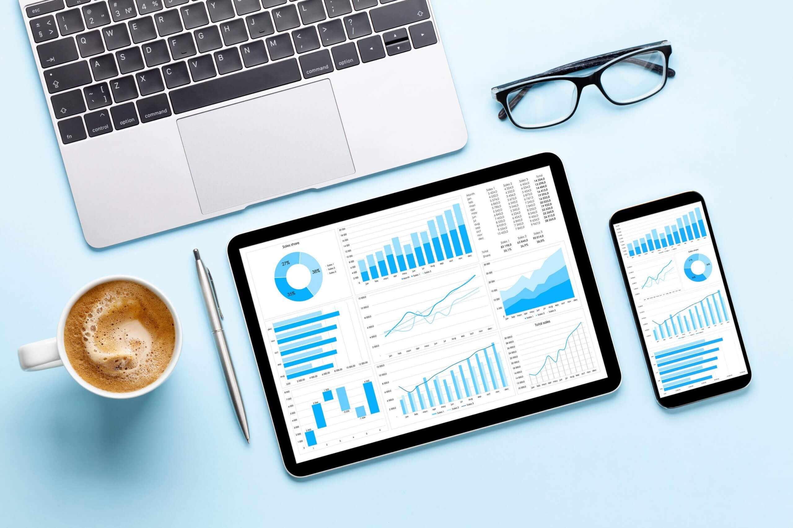 Tablet and smartphone with charts and reports